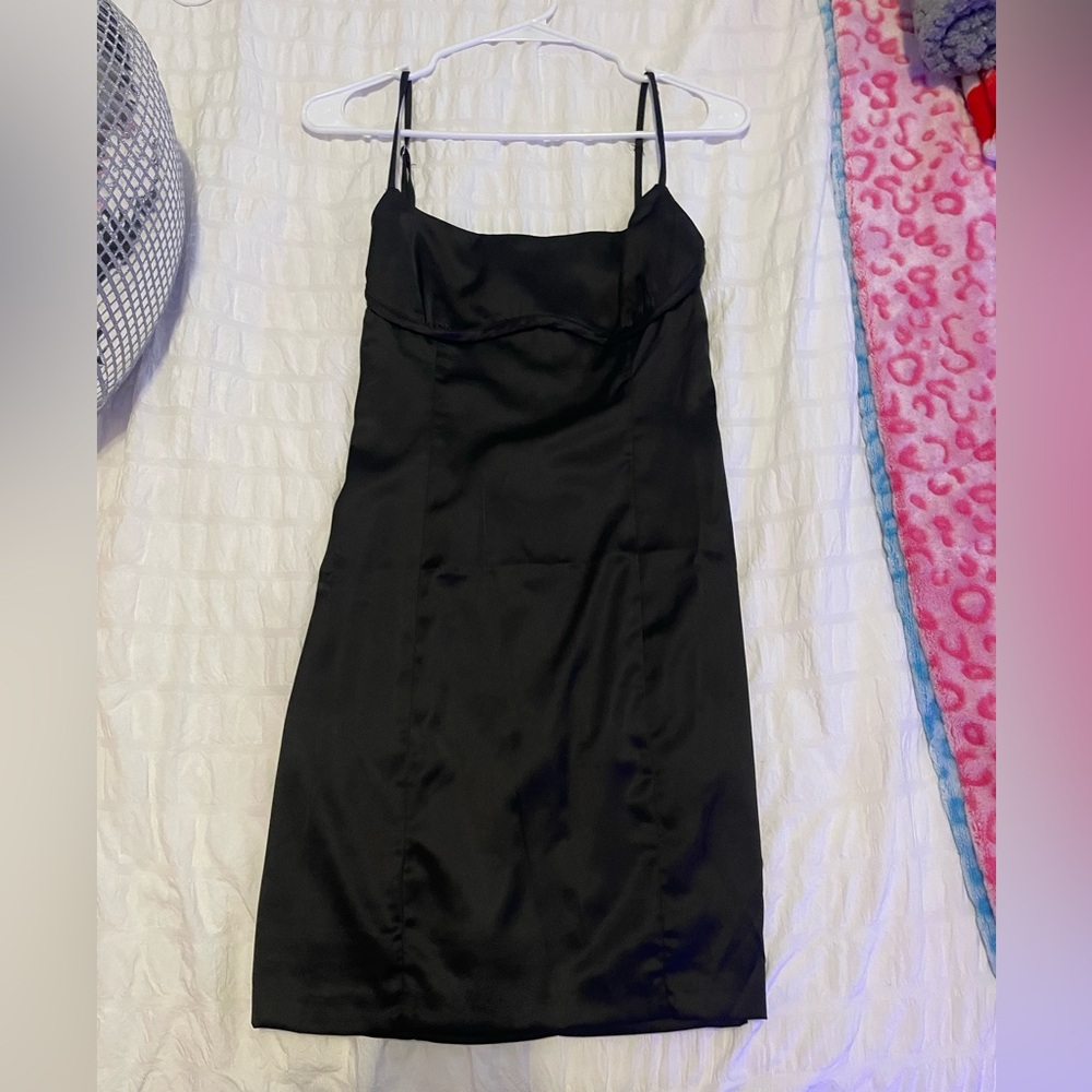 small black dress, has an open back